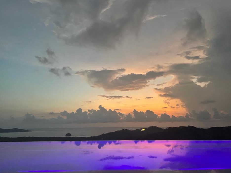 Purple reflection night time pool
